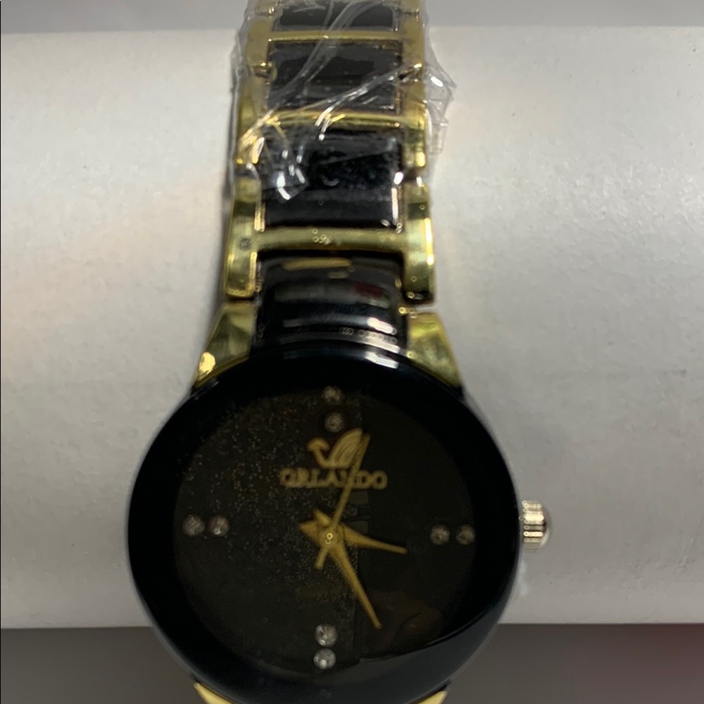 Gold and Black Watch with Quartz Movement